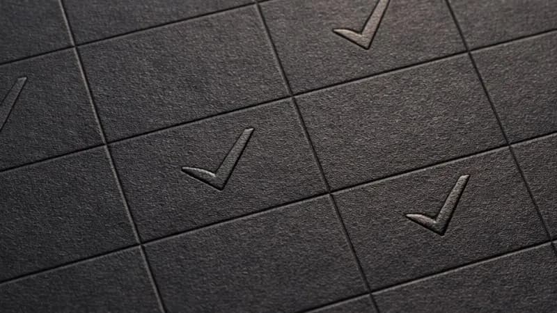 Checklist grid with ticks representing an AI receptionist vendor evaluation checklist